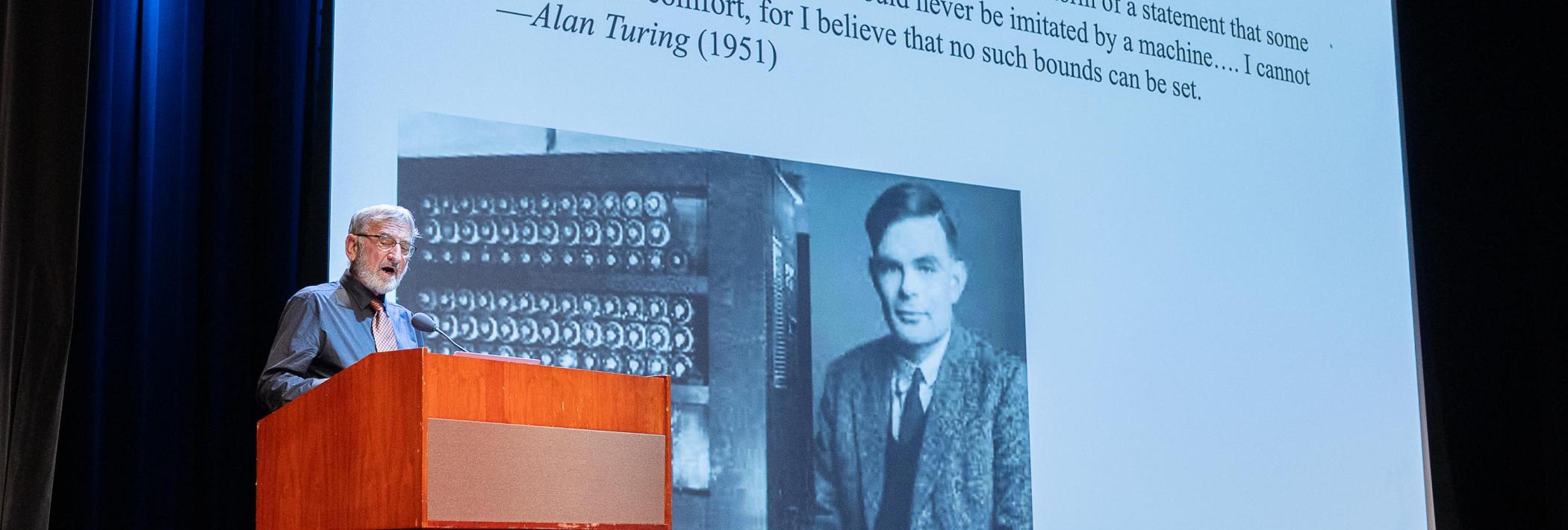 Keith Holyoak presenting slide 3 showcasing Alan Turing quote